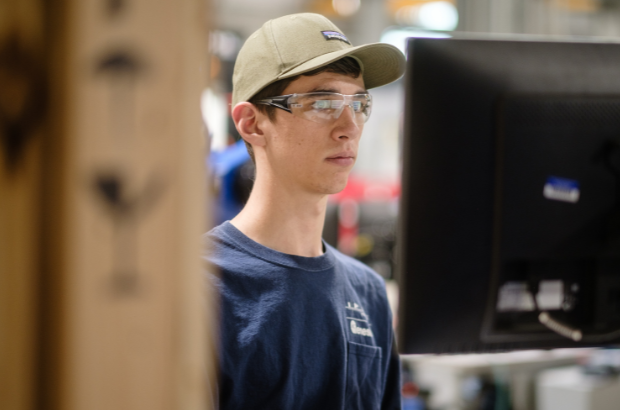 Manufacturing employee on a computer